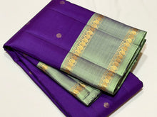 Sahana- Gorgeous Aubergine Purple with Dual tone Green Handwoven Pure Kanjivaram Silk with Polka Dots woven body with beautiful rettapet borders classic rich pallu and contrast woven blouse