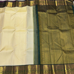 Creamish white with bottle green Handwoven Pure Jari Korvai muthukattam with beautiful borders Kanjivaram Silk Saree Beauty