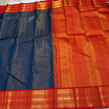 Vaibhogam-Gorgeous Sapphire Blue with Orange Red Vairaoosi Handwoven Pure Jari Korvai Kanjivaram Silk with rich closely woven vairaoosi body gorgeous borders beautiful and finely woven rich pallu and contrast woven blouse