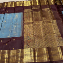 Vaibhogam-Beautiful Pastel Blue with Dark Brown Handwoven Pure Jari Korvai Kanjivaram Silk with Vairaoosi with buttas woven middle body with coffee brown buttas woven lower body and rich broad borders gorgeous pallu and contrast woven blouse