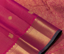 Vaibhogam- Beautiful Dual tone Orange Pink with Green Vairaoosi with Buttas Handwoven Pure Jari Kanjivaram Silk with rich bawanchi borders with green selvedges gorgeous Kalakshetra Kili Pallu and contrast green Jari striped blouse