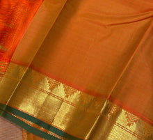 Sahana- Gorgeous Beige with Rustic Orange Handwoven Pure Jari Kanjivaram Silk with Muthukattam checks woven body with beautiful borders with green selvedges rich seer pallu and contrast woven blouse