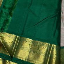 Vaibhogam-Gorgeous Beige Abirami with Ganga Jamuna borders Striped body with silk thread buttas with rich bottle green rich and beautifully wovwn pallu and contrast woven blouse