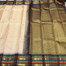 Vaibhogam -Gorgeous Handwoven Pure Jari Vairaoosi Korvai Kanjivaram Silk in tussar white with kanchana black combination with varisaipet beautiful borders with temples woven with rich pallu and contrast Vairaoosi woven beautiful blouse