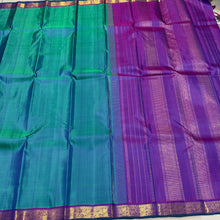 Nayaki- Gorgeous Peacock Bluish Green with Purple with Small borders Handwoven Pure Jari Kanjivaram Silk with rich seer pallu and contrast woven purple blouse