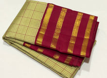 Vaibhogam- Stunning Pastel Green with Arakku Red Handwoven Pure Jari Korvai Kanjivaram Silk with Checked body and tetrapet beautifully woven borders rich finely woven pallu and contrast woven blouse