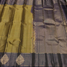 Sahana- Gorgeous Bronze Gold with Blackish Purple Handwoven Pure Jari Kanjivaram Silk with Striped body with rich jarioosi with buttas woven borders beautifully woven pallu and contrast blouse