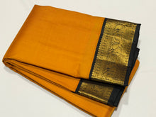 Sarasangi - Gorgeous Mustard with Black Handwoven Pure Jari Korvai Kanjivaram Silk with beautiful black double parrots woven borders with rich pallu and contrast woven blouse