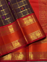 Vaibhogam- Gorgeous Coffee Brown with Red Handwoven Pure Zari Kanijivaram Silk with rich jari checks and meena buttas woven beautiful body with rich borders pallu very intricately woven and contrast woven blouse