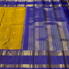 Sahana- Gorgeous Bronze Gold with Violetish Blue Handwoven Pure Jari Kanjivaram Silk with buttas woven body with doublepet borders with gorgeous meenakari woven pallu and contrast woven blouse