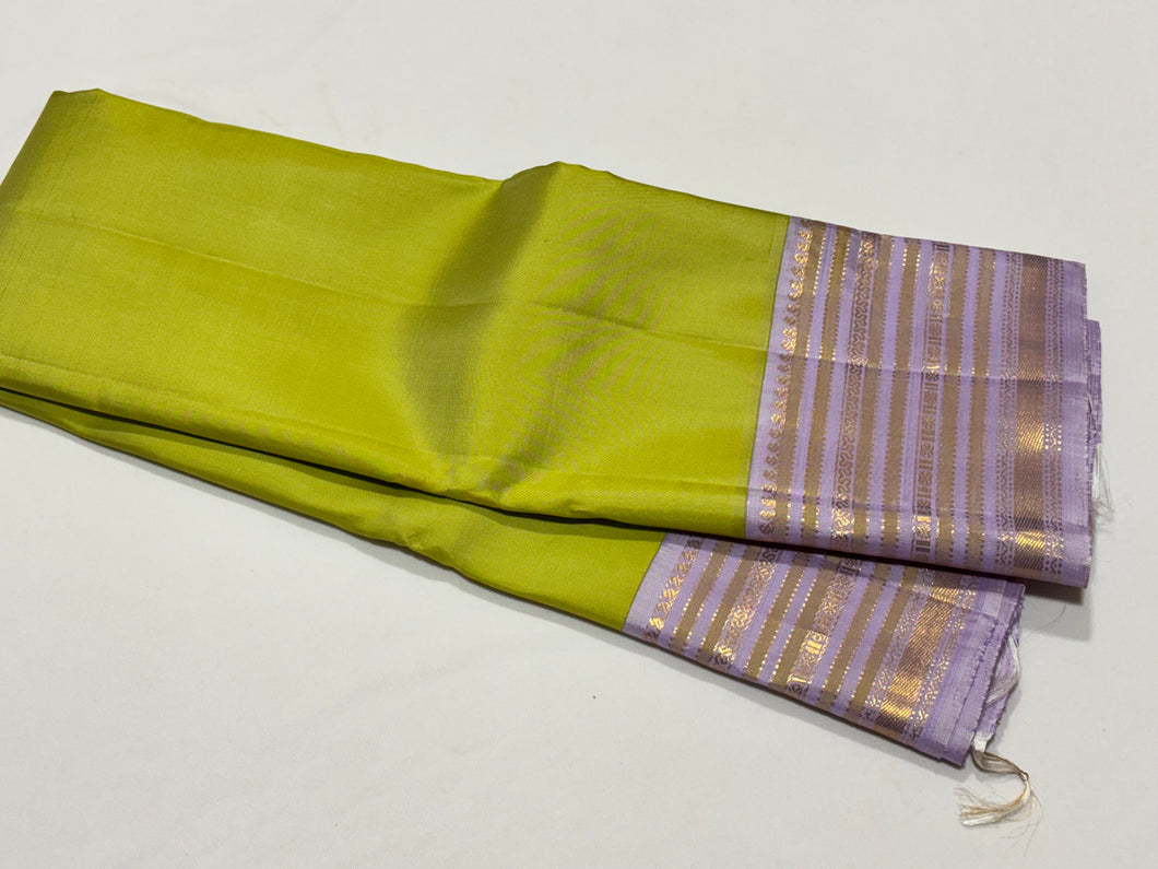 Mesmerising Pastel Grape Green with Lavendar Handwoven Kai Korvai Kanjivaram Silk Saree with rich varisaipet borders rich pallu and contrast woven blouse beauty