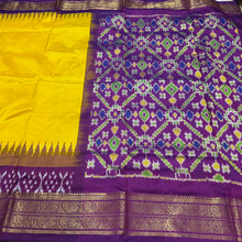Arabhi- Gorgeous Yellow with Purple Handwoven Pure Double Ikat Silk with beautifully woven body with temples and ikat style woven kanchi borders rich pallu and contrast woven blouse