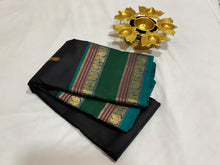 Black with Emerald Green Handwoven Pure Kanjivaram Silk Saree with thilagam buttas woven body doublepet borders elephants woven pallu and contrast blouse