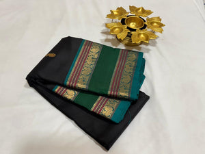 Black with Emerald Green Handwoven Pure Kanjivaram Silk Saree with thilagam buttas woven body doublepet borders elephants woven pallu and contrast blouse