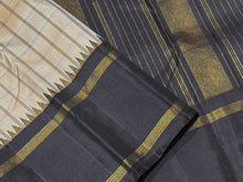 Khakhi Beige with Kanchana Black Handwoven Pure Jari Korvai Checked Kanchipuram Silk Saree with Rettapet borders Seer Pallu and contrast woven blouse beauty