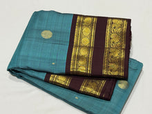 Gorgeous Teal Blue with Coffee Brown Buttas with Rettapet Borders Handwoven Pure Jari Kanjivaram Silk Saree beauty