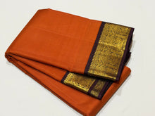 Sarasangi- Gorgeous Rust with Coffee Brown Handwoven Pure Korvai Kanjivaram Silk with beautiful borders rich pallu and contrast woven blouse.