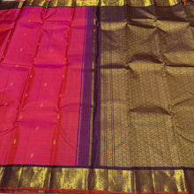 Vaibhogam-Beautiful Double tone Tomato Pink with deep maroonish brown with orange selvedges Handwoven Pure Korvai Kanjivaram Silk with floral buttas woven body beautiful elephants and annapakshis woven gorgeous borders rich pallu and contrast woven blouse