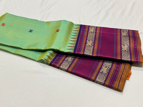 Pista Green with Navy Blue Buttas Korvai Handwoven Pure Zariless Kanjivaram Silk Saree Beauty with Long Borders