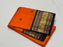 Vaibhogam -Strikingly Beautiful Orange with Deep kanchana Blue Kai Korvai Handwoven Pure Jari with Silk Buttas Pure Kanjivaram Silk with rich Meenakari Work Woven Borders gorgeous pallu and contrast woven blouse