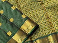A Deep Emerald Green with Gold Vairaoosi with Buttas Handwoven Pure Jari Kanjivaram Silk Saree with rich borders pallu and self colored blouse beauty