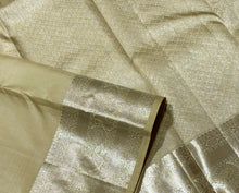 Pastel Green Tinted Cream with Silver Jari Buttas Handwoven Pure Kanjivaram Silk Saree with rich borders pallu and self colored blouse beauty