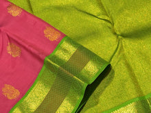 Deep Flamingo Pink with Leaf Green Korvai with Buttas Handwoven Pure Jari Kanjivaram Silk Saree with gorgeous meenakari borders rich pallu and contrast woven blouse beauty