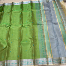 Gorgeous Parrot Green with Beige and Blue Handwoven Pure Zariless Kanjivaram Silk with beautiful thread buttas woven body with gorgeous borders pallu and striped blouse