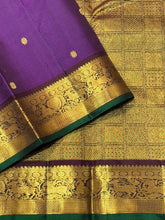 Nayaki- Gorgeous Deep Purple with Brown Buttas Handwoven Pure Jari Kanjivaram Silk with beautiful deers woven borders rich pallu and contrast woven blouse