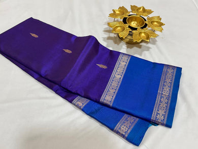 Violetish Blue with Lapis Blue Handwoven Pure Korvai Kanjivaram Silk Saree with Buttas Body Doublepet Borders rich Simhayazhi Pallu and Contrast Blouse