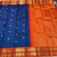 Vaibhogam-Stunning Deep Peacock Blue with Orange Handwoven Pure Jari Korvai with Elephant and Annapakshi Buttas woven Kanjivaram Silk Sarees with Intricate Meenakari Woven Borders Rich Pallu and Contrast woven blouse