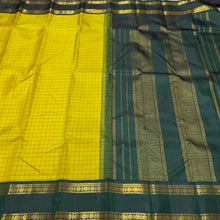Sahana- Stunning Lemon Sampanga with Bottle Green Handwoven Pure 2g Jari Korvai Kanjivaram Silk with Checked body with rettapet double borders rich pallu and contrast woven blouse