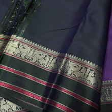 Saraswati- Gorgeous Purple with Dark Blackish Green Handwoven Pure Zariless Kanjivaram Silk with beautiful chakram and deer motifs woven all over the body with beautiful butterflies and deers woven borders l sorgavaasal pallu and contrast woven blouse