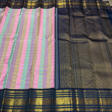 Vaibhogam- Beautiful Palum Pazhamum Jari Checks in pastel palette of colors in Handwoven Pure Zari Korvai Kanjivaram Silk with rich jari checks body with Deep sapphire blue borders intricate and beautifully woven with rich pallu and contrast blouse