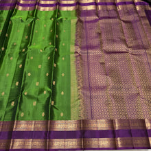 Sahana- Stunning Emerald Green with Dark Purple Buttas Handwoven Pure Kanjivaram Silk with beautiful doublepet borders rich pallu and contrast woven blouse