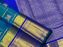 Gorgeous Peacock Blue Green with Royal Blue Handwoven Pure Jari Kanjivaram Silk Saree with Rettaikili motifs in Jari Checked body rich borders Pallu and Contrast woven blouse
