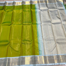 Mesmerizing Tender Leaf Green with Ice Blue combination with Vairaoosi woven gorgeous body with intricately woven borders with elephants and yazhi motifs with gorgeous pallu with yazhis elephants and peacocks woven with beautiful ice blue contrast blouse.