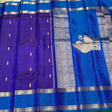 Violetish Blue with Lapis Blue Handwoven Pure Korvai Kanjivaram Silk Saree with Buttas Body Doublepet Borders rich Simhayazhi Pallu and Contrast Blouse