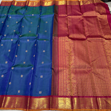 Vaibhogam- Gorgeous Peacock Blue with Deep Arakku Red  Handwoven Pure 2g Jari Korvai with Buttas Kanjivaram Silk with rich borders gorgeous pallu and contrast woven blouse