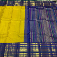 Vaibhogam- Stunning Yellow with Royal Blue Handwoven Pure Zari Korvai Kanjivaram Silk with Buttas Rich Varisaipet Borders gorgeous Meenakari work Pallu and Contrast woven blouse