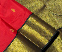 Vaibhogam- Gorgeous Red with Black Pure 2g Jari Korvai with Buttas Handwoven Kanjivaram Silk with beautiful rich borders gorgeous pallu and contrast woven blouse