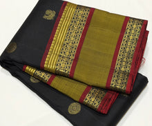 Sahana- Black with Bronze Gold Handwoven Pure Kanjivaram Silk with beautiful buttas woven body with doublepet borders rich zari and thread woven gorgeous pallu and contrast woven blouse