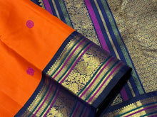 Vaibhogam -Strikingly Beautiful Orange with Deep kanchana Blue Kai Korvai Handwoven Pure Jari with Silk Buttas Pure Kanjivaram Silk with rich Meenakari Work Woven Borders gorgeous pallu and contrast woven blouse