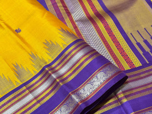 Yellow with Purple Buttas Handwoven Pure Zariless Korvai with temple borders Zariless Kanjivaram Silk Saree Beauty