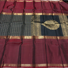 Sahana- Stunning Black with Deep Maroonish Brown Handwoven Pure Jari Kanjivaram Silk with Lakshadeepam Mubbagam Style woven beautiful body with long borders rich pallu and black color blouse with maroonish brown borders