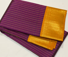 Vaibhogam- Gorgeous Deep Magenta with Mustard Handwoven Pure2g Jari Korvai Kanjivaram Silk with beautiful striped body with rich korvai borders beautiful rich seer pallu and contrast woven blouse
