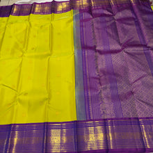 Vaibhogam-Mesmerizing Green Sampanga with Purple Handwoven Pure Jari Korvai Kanjivaram Silk with beautiful mayil chakram buttas woven body with rich gettipet borders rich pallu and contrast woven beautiful blouse