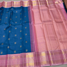 Vaibhogam- Gorgeous Peacock Blue with Soft Pink Handwoven Pure Jari Korvai Kanjivaram Silk  with mayil chakram buttas woven body with rich meenakari borders beautiful and intricately woven pallu and contrast woven blouse
