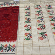 Arabhi- Stunning Rust with Creamish Offwhite Handwoven Premium Zariless Double Ikat with beautiful body with rich Ikat style woven borders pallu and contrast offwhite blouse