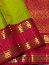 Vaibhogam- Gorgeous Parrot Green with Red Handwoven Pure Zari Korvai Kanjivaram Silk with Buttas woven body with rich doublepet vairaoosi borders with rudrakshas woven beautiful rich pallu and contrast woven red blouse